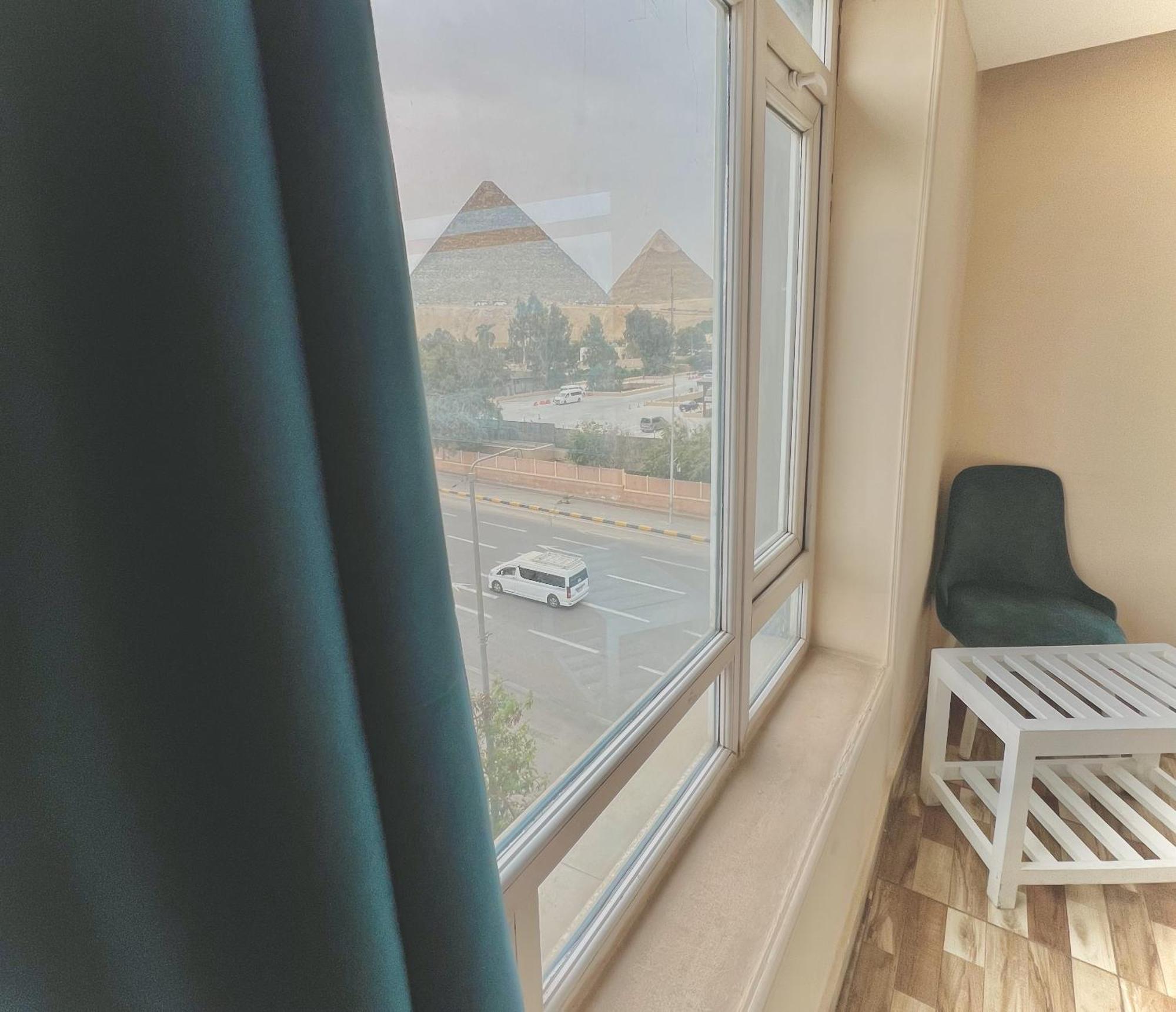 Turquoise Pyramids & Grand Egyptian Museum View Hotel Kafrat al Jabal Luaran gambar